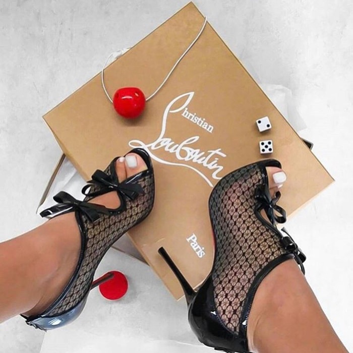 Christian Louboutin's 'Empiralta' sandals have been made in Italy from sheer mesh that's intricately embroidered to create the illusion of lace