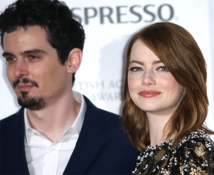 Emma poses with director Damien Chazelle