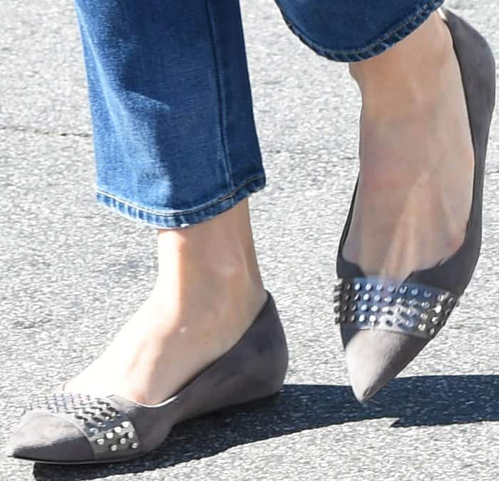 Comfy and stylish: Jessica steps out in a pair of studded Jimmy Choo flats