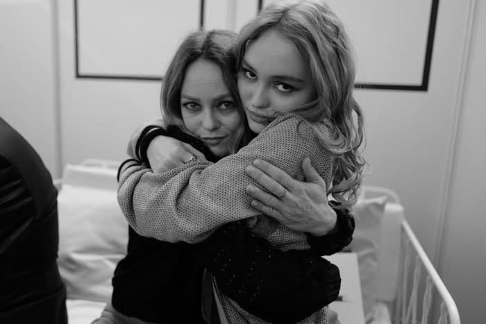 Lily-Rose gives her mother a tight hug backstage