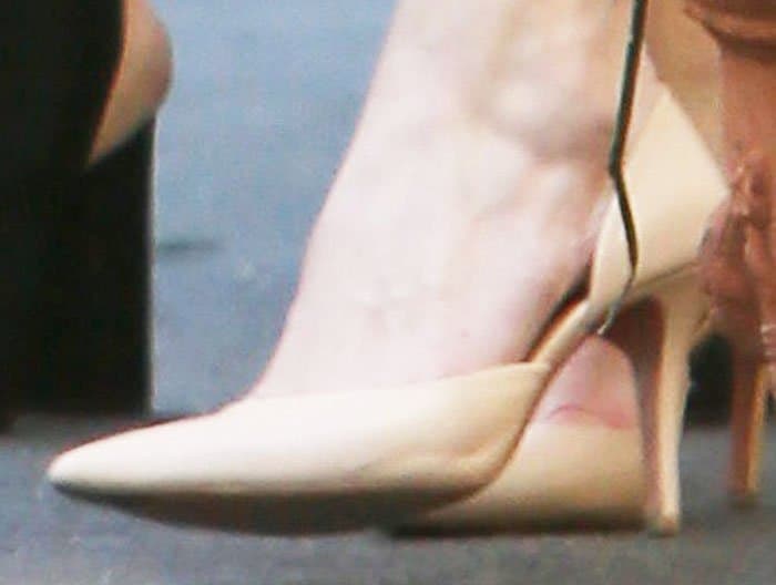 Michelle balances out the pink with her nude Céline d'orsay pumps