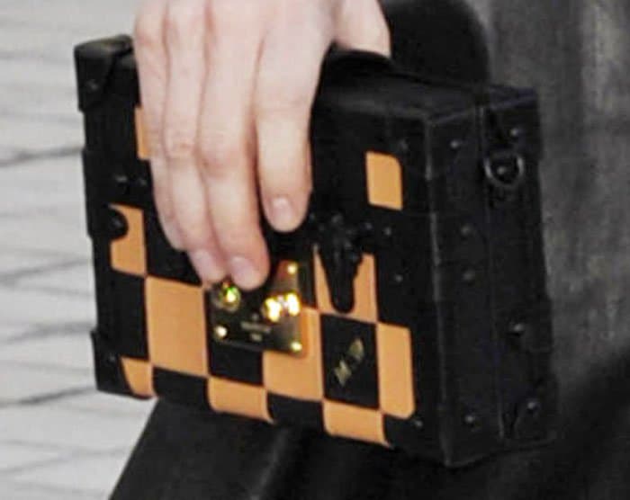 The actress dons one of Louis Vuitton's infamous rectangular clutches