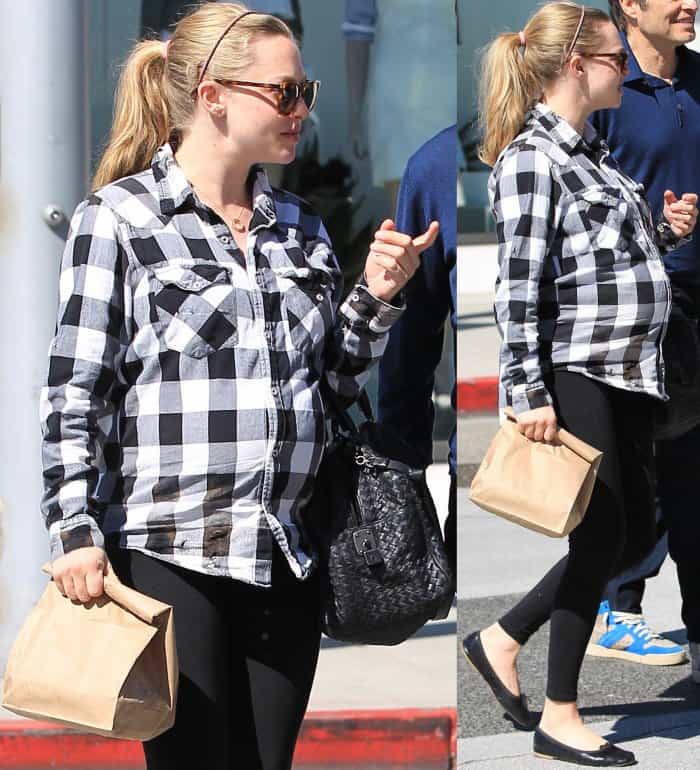 Amanda Seyfried wearing a black and white checkered shirt, black Seraphine leggings, and black ballet flats while out and about in LA