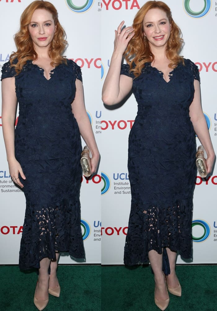 Christina Hendricks wearing a Shoshanna navy lace gown and nude satin pumps at the Innovators for a Healthy Planet Gala
