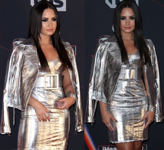 Demi Lovato wearing a metallic ensemble with silver Christian Dior pointed-toe pumps at the 2017 iHeartRadio Music Awards