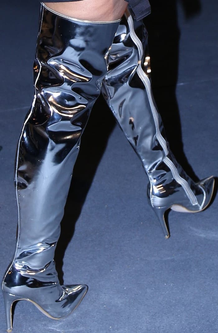 Nicki Minaj wearing Balenciaga mirrored thigh-high boots