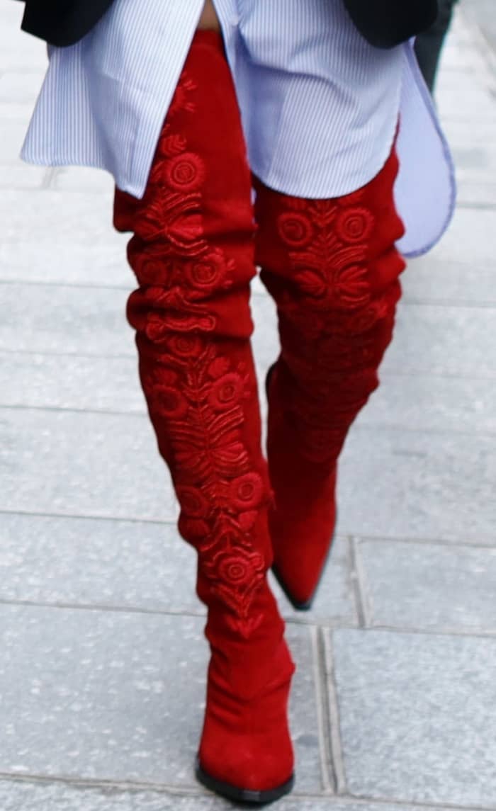 Rita Ora wearing red H&M thigh-high suede boots while out and about in Paris