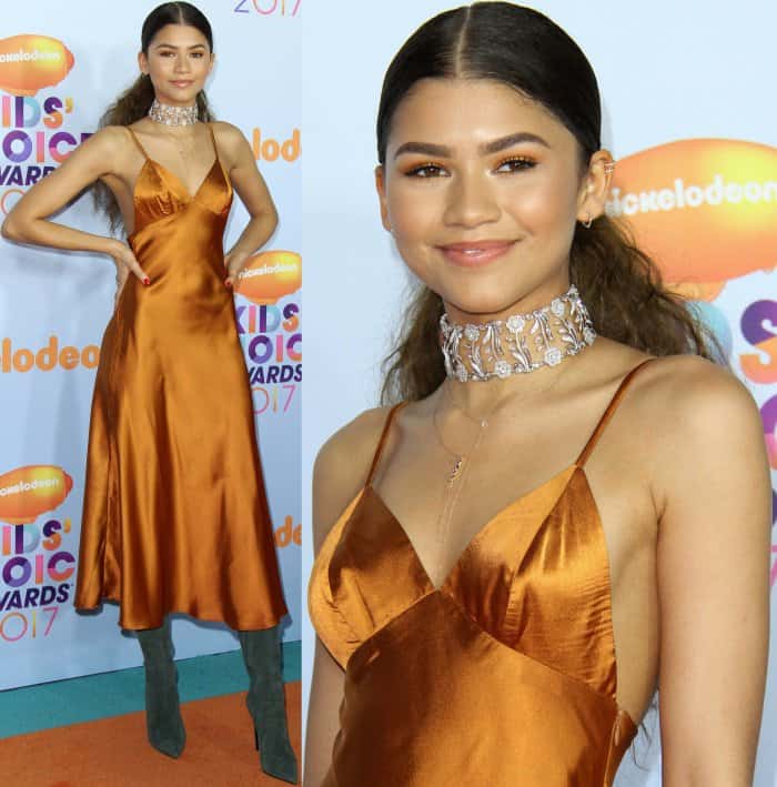 Zendaya wearing a Daya by Zendaya satin slip dress and Le Silla green suede over-the-knee boots at the 2017 Kids’ Choice Awards