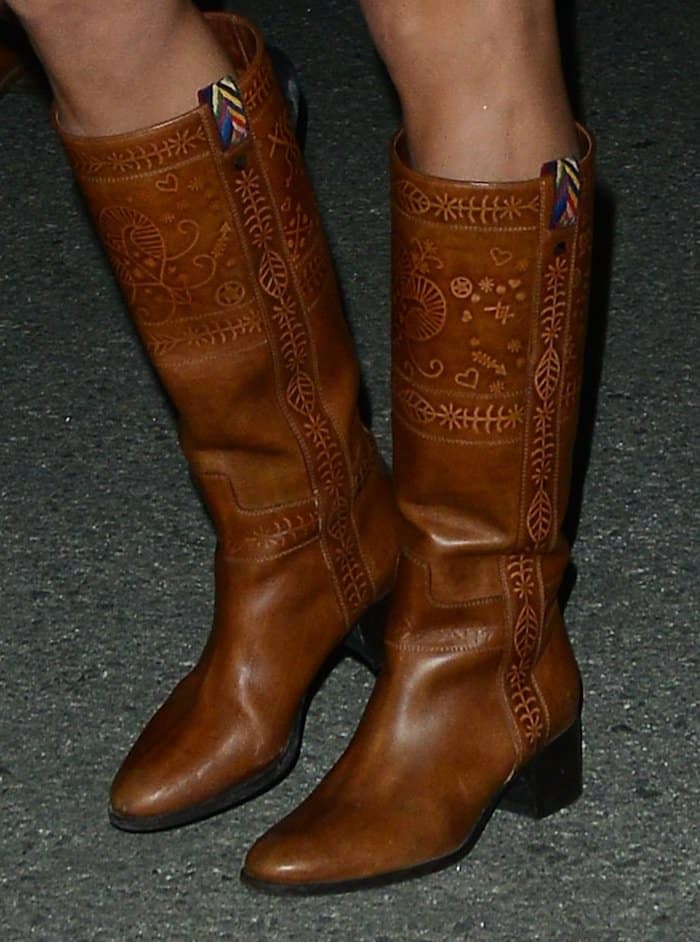 Alessandra Ambrosio finished her country chic ensemble with a pair of brown leather boots