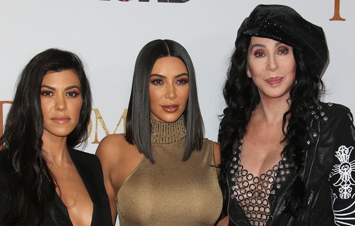 Kim Kardashian was joined by older sister Kourtney and megastar Cher at the premiere