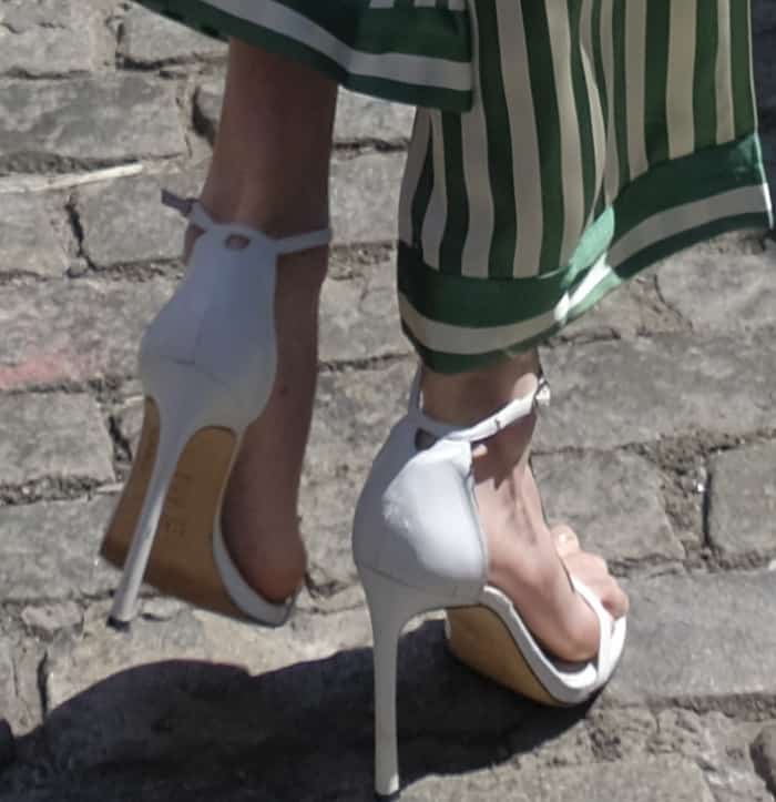 Gigi Hadid wearing Stuart Weitzman "Nudistsong" sandals in NYC