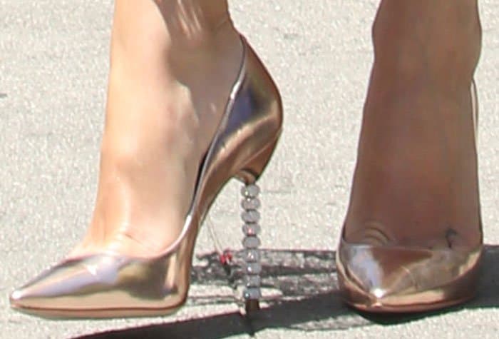 Kate adds some shine to her look with a pair of Sophia Webster "Coco Crystal" pumps