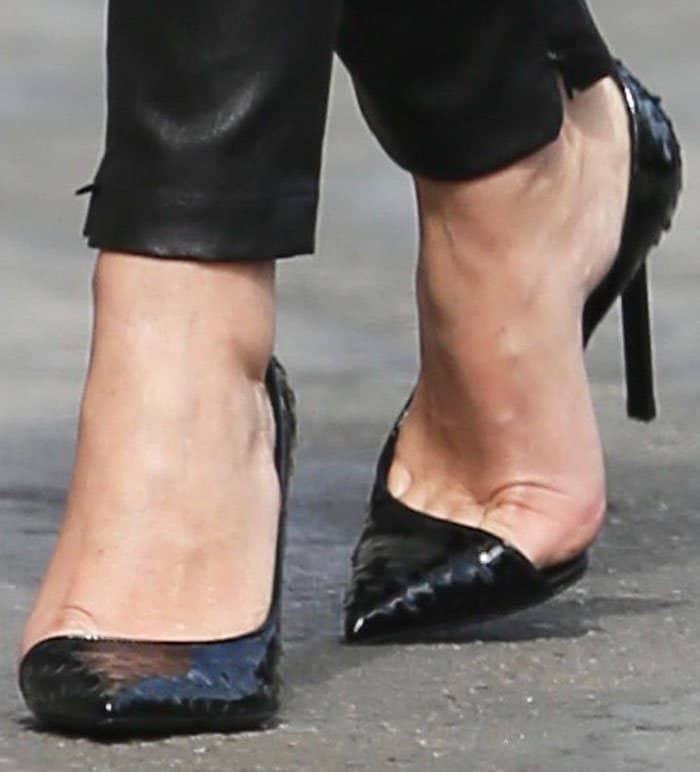 The actress added an interesting touch to the classic black pumps in an embossed pair of Saint Laurent "Anja" pumps