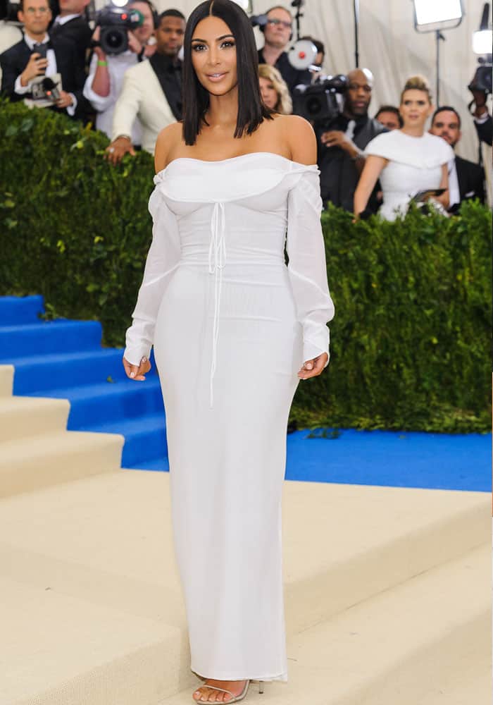Kim decides to keep things simple this year in an off-shoulder Vivienne Westwood dress