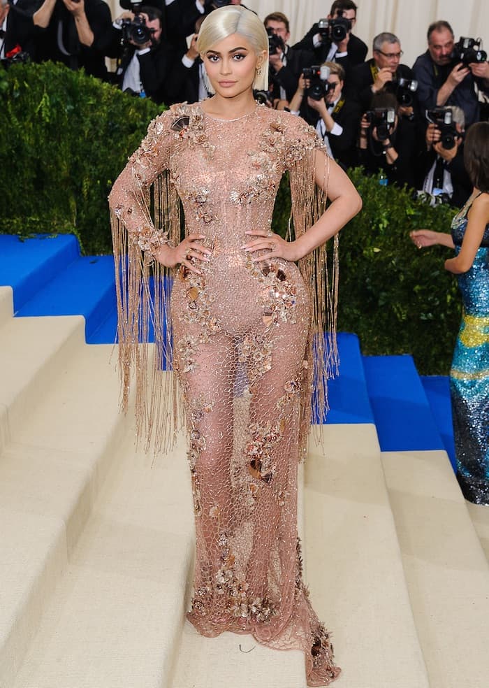 Kylie Jenner bares her body in a sheer custom Versace creation at the MET Gala on May 1, 2017 at the Metropolitan Museum of Art in New York City
