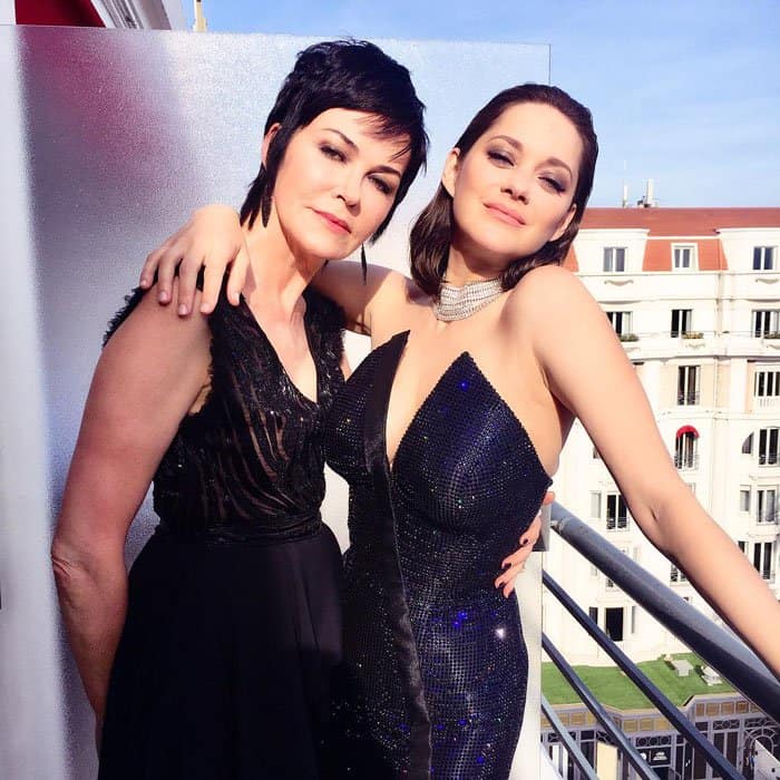Marion poses with a friend right before leaving for the Cannes gala event