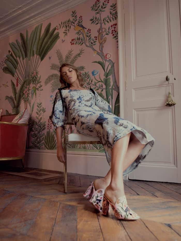 Arizona Muse wearing the Aquazzura for de Gournay embroidered mules with Erdem’s “Bree” floral fil coupe dress