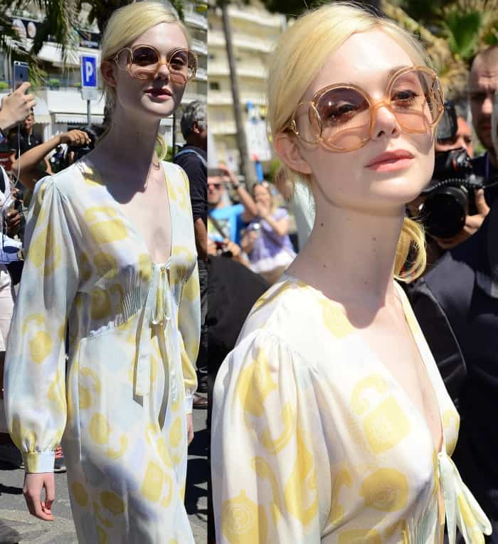 Elle Fanning wearing a Miu Miu maxi dress and Jimmy Choo "Myla" mules while out and about in Cannes