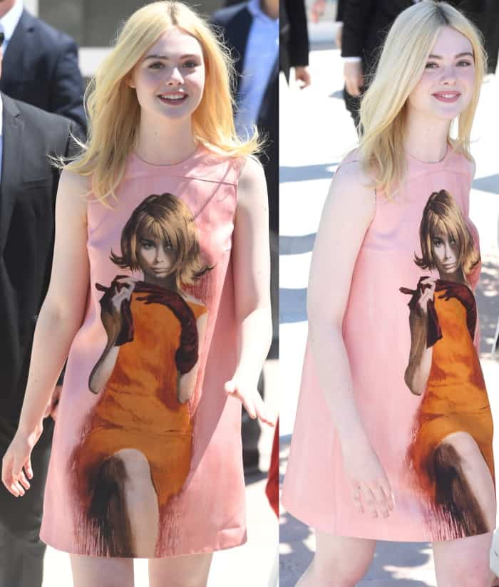 Elle Fanning wearing a Prada fall 2017 shift dress and Laurence Dacade "Lilas" satin pumps at the 70th Cannes Film Festival "How to Talk to Girls at Parties" photocall