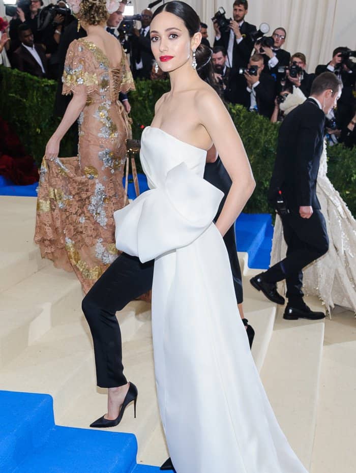 Emmy Rossum wearing a custom Carolina Herrera look and Christian Louboutin heels at the 2017 Met Gala