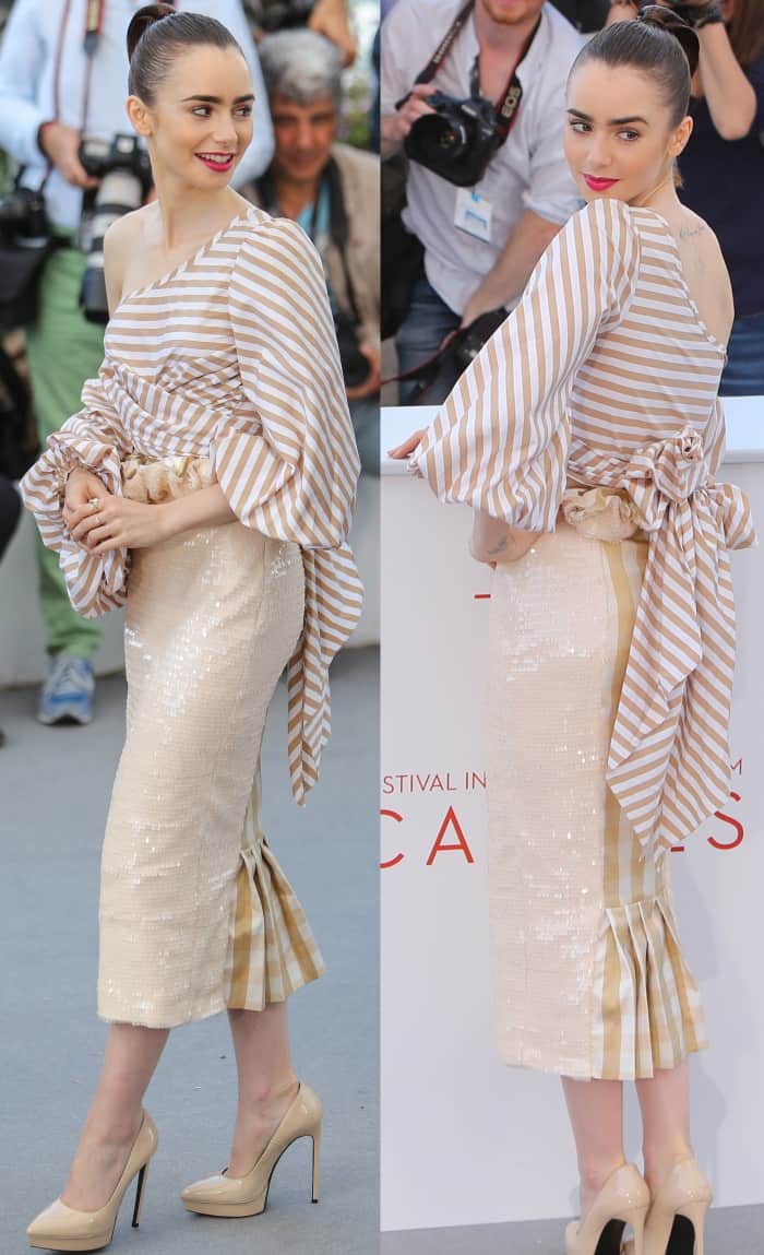 Lily Collins wearing a Johanna Ortiz ensemble and Saint Laurent "Janis" pumps at the 70th Cannes Film Festival "Okja" photocall