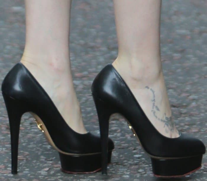 Lily Collins wearing Charlotte Olympia "Dolly" pumps at the ITV studios in London