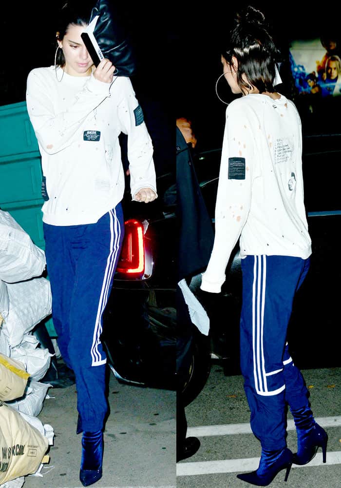 Kendall shows off a distressed athleisure look in Adidas x Alexander Wang track pants