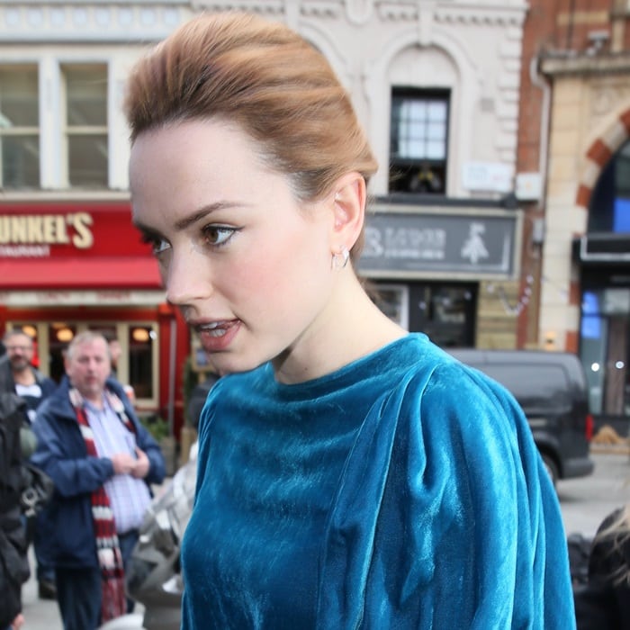 Daisy Ridley showing off her new lighter strawberry blonde hair color while heading into Global studios in London on March 9, 2018