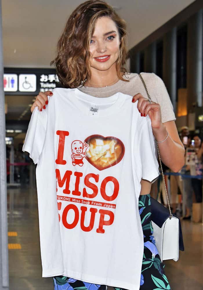 Miranda poses with a fan-given "I Love Miso Soup" shirt