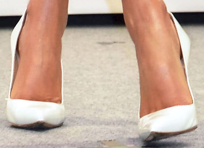Miranda pairs her dainty look with the Manolo Blahnik "BB" pumps in white leather