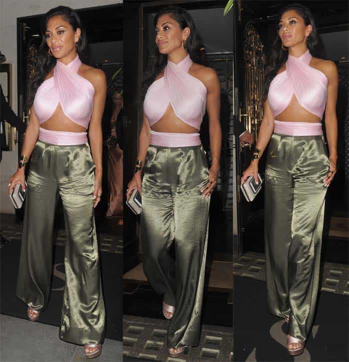 For a dinner out at Scott’s restaurant last week, the singer wore green palazzo pants paired with a nude halter top that showed of her toned midsection and tanned glow