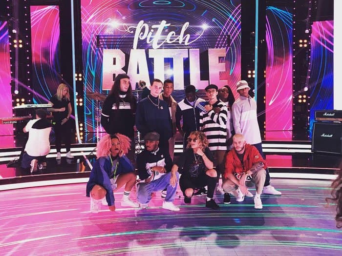 The pop star snaps a photo with her backup dancers during rehearsals at "Pitch Battle: Live Final"