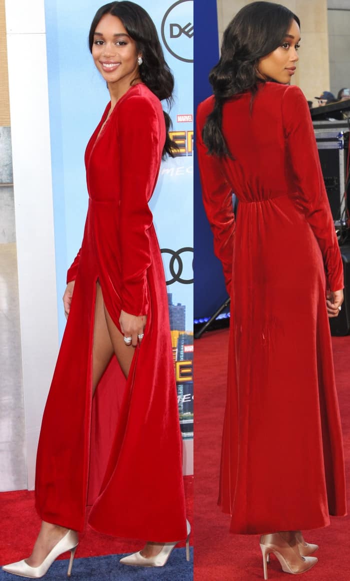 Laura Harrier wearing a crimson Calvin Klein By Appointment velvet dress and white Manolo Blahnik satin pumps at the "Spider-Man: Homecoming" LA premiere