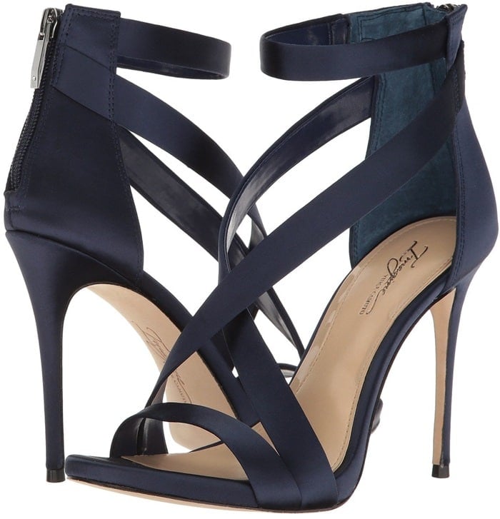 An alluring strappy sandal is given a daring lift by an ultra-slender stiletto heel.
