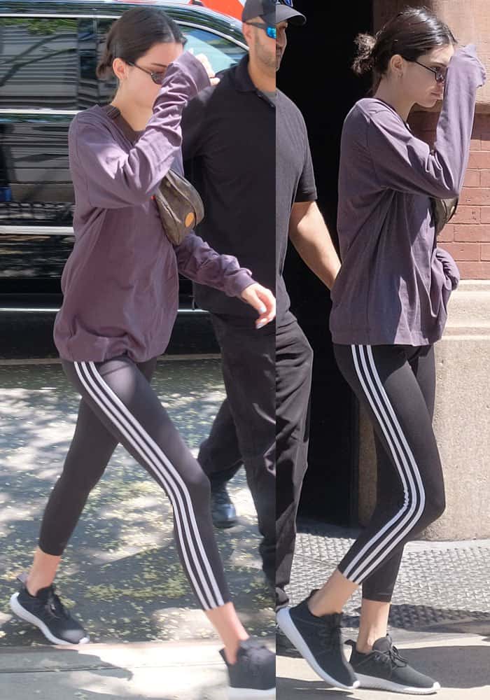 Kendall covered up her Adidas attire with a long sleeved top