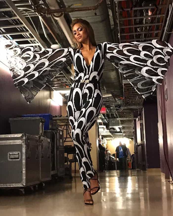 Tyra poses backstage in her Stello jumpsuit