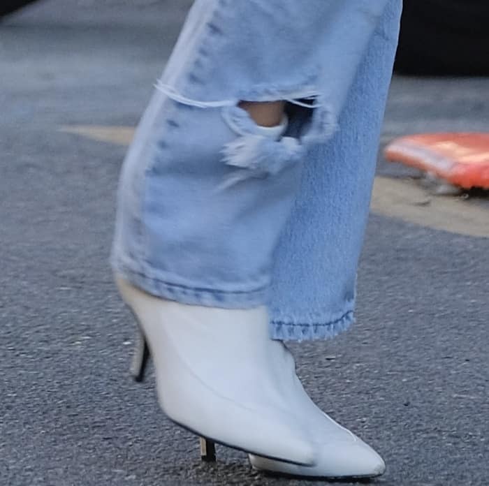 Bella Hadid wearing Stuart Weitzman "Clingy" booties while out and about in NYC