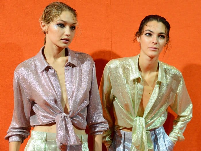 Gigi and Vittoria Ceretti sport the beautiful metallic fabric pieces from the Spring/Summer 2018 line