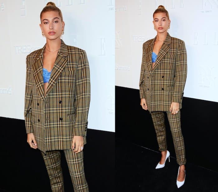 Hailey Baldwin went the opposite direction with a masculine two-piece suit consisting of plaid pants rolled at the hem and an oversized blazer