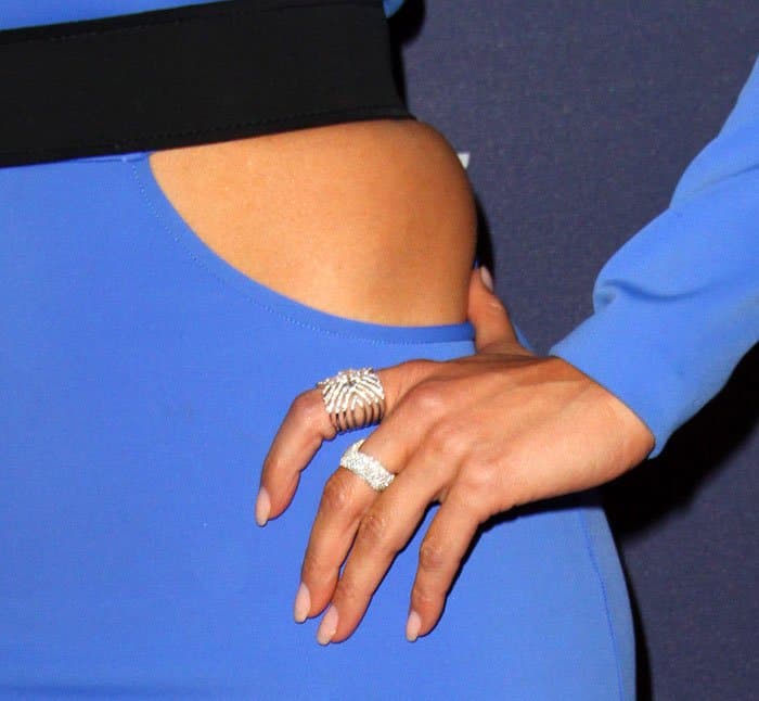 Bling-bling: J.Lo slathers her fingers in diamonds with rings from Djula and Pasquale Bruni