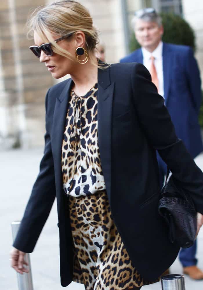 The day before, Kate was seen out and about in a leopard print dress