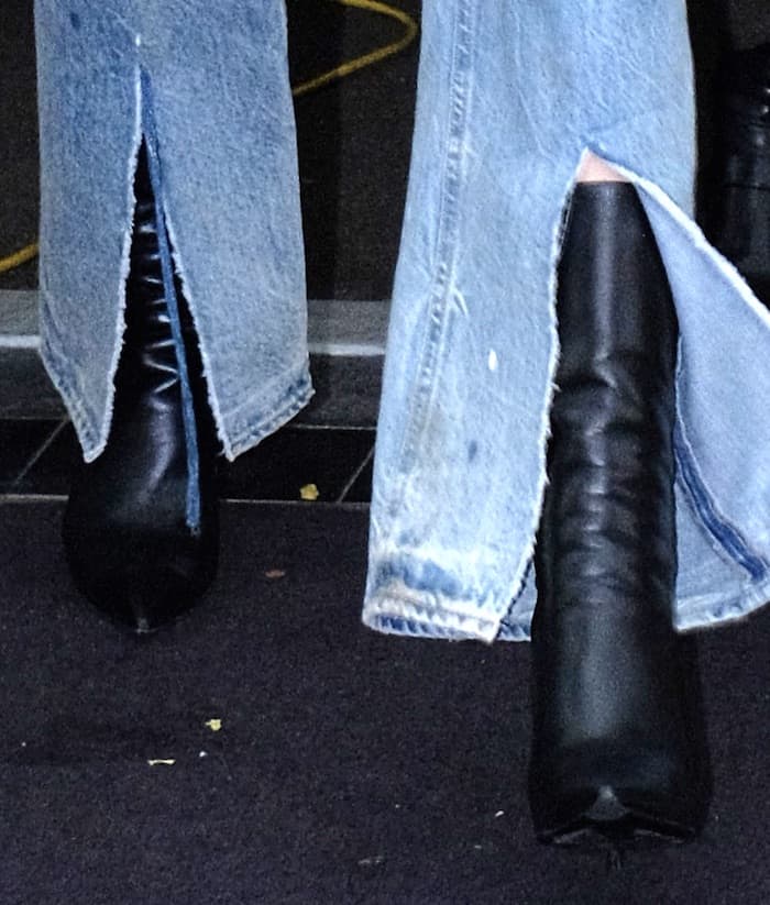 Kendall Jenner in NYC wearing distressed jeans, oversized blazer and Balenciaga "Knife" booties.