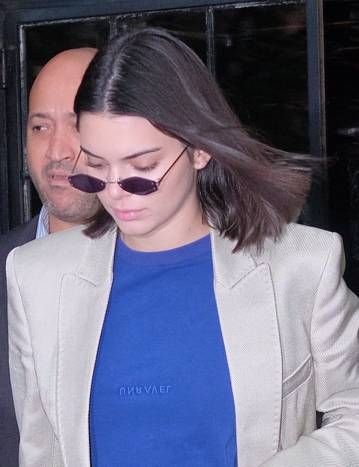 Kendall Jenner in NYC wearing distressed jeans, oversized blazer and Balenciaga "Knife" booties.