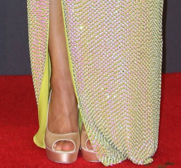Gugu Mbatha-Raw showing off her pedicured toes in Jimmy Choo "Vibe" platform pumps