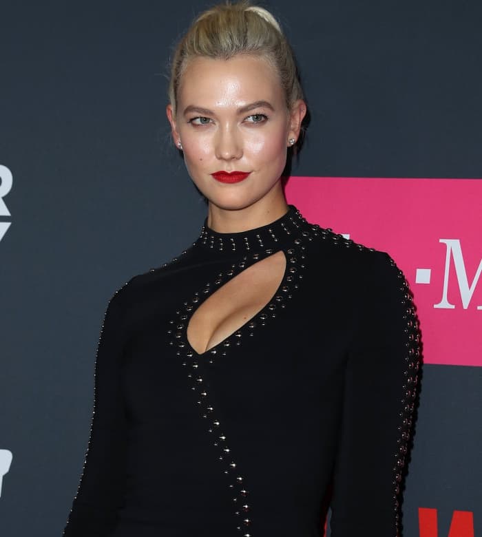 Karlie Kloss wearing a studded black dress at the Mayweather vs. McGregor pre-fight VIP party