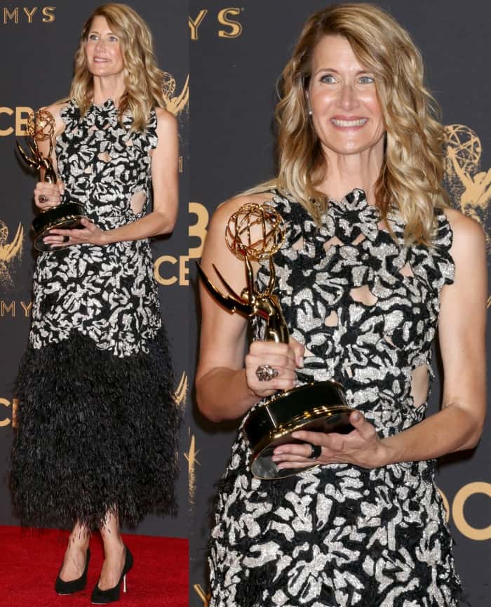 Laura Dern showing off her award for Outstanding Supporting Actress at the 69th Emmy Awards press room