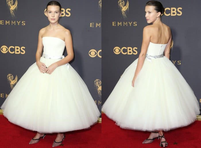 Millie Bobby Brown wearing a Calvin Klein By Appointment gown and Calvin Klein 205W39NYC slingback pumps at the 69th Emmy Awards