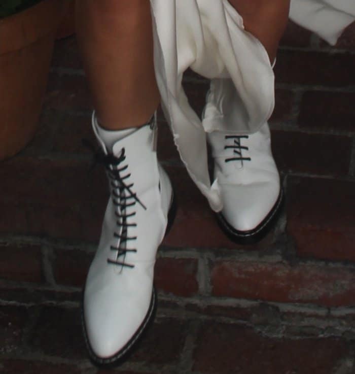 Sofia Richie wearing The Row "Fara" lace-up leather combat boots