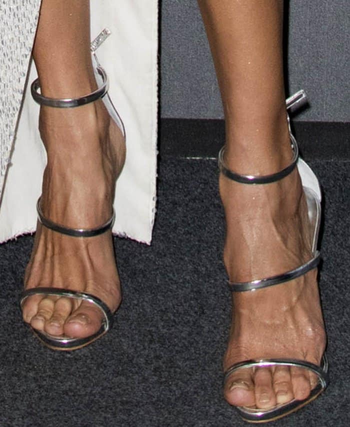 Alessandra Ambrosio wearing Giuseppe Zanotti "Harmony" sandals in mirrored silver patent leather at the 2017 amfAR Milano gala