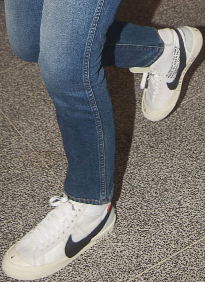 Bella Hadid wearing Off-White for Nike "Blazer Mid" sneakers at the Milan-Malpensa Airport